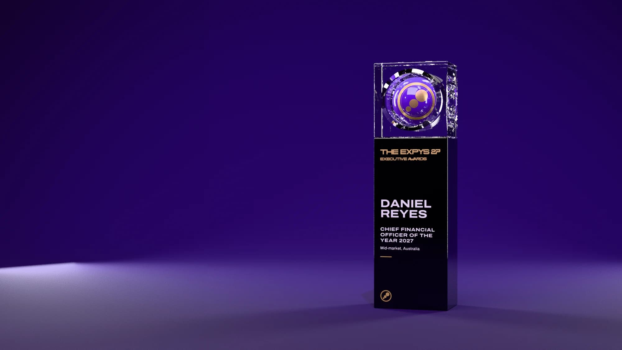 A single Expys 27 trophy for an Executive Awards winner under purple light